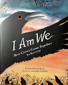 An American Crow in flight with the book title "I AM WE" written on the wing